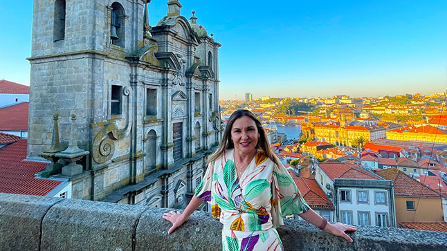 Owner of North Star travel agency in Lisbon, Portugal posing for a photo during sunrise.