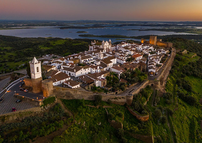 Early morning drone picture overlooking the medieval castle in Monsaraz, Portugal