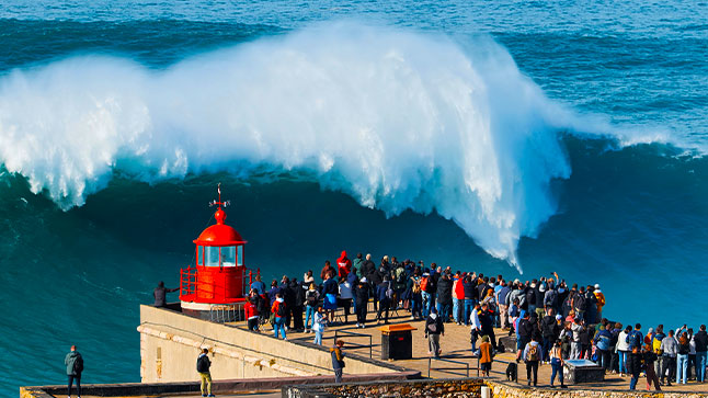 On the coastal of Portugal at Nazare were world famous wave crashing in front of spectators