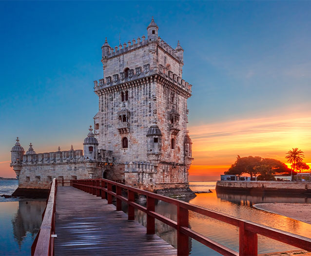 Belem Tower or Tower of St Vincent on the bank of the Tagus River at scenic sunset, Lisbon, Portugal